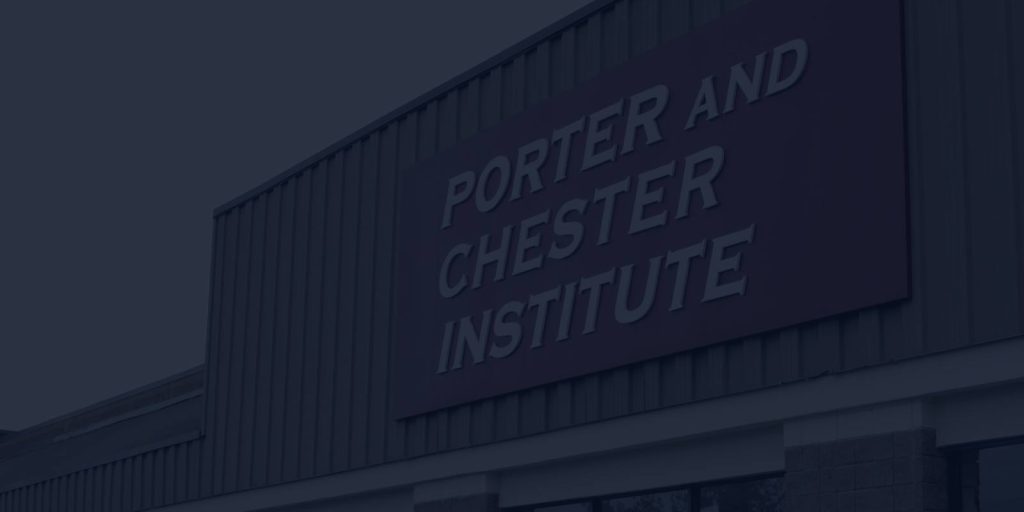 Exterior view of a building with Porter and Chester Institute sign on the facade.